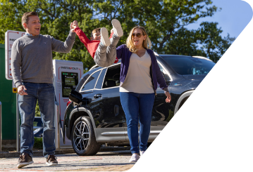 Family using an InstaVolt electric vehicle rapid charging station / point